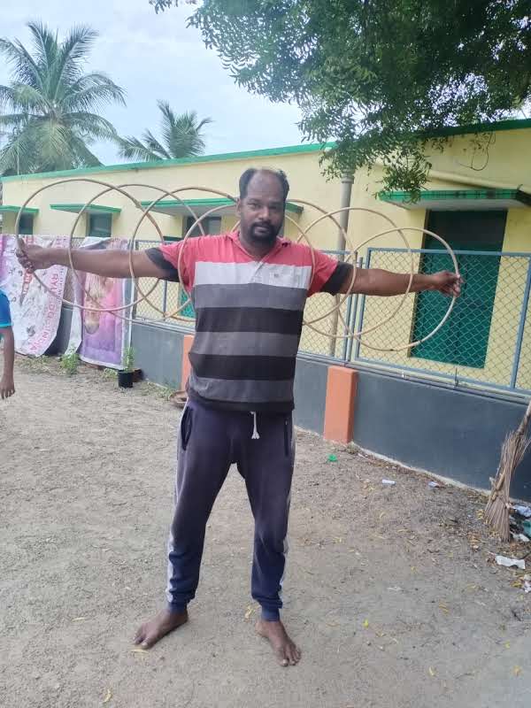 Dr. N. Ramesh Aasaan demonstrating traditional Indian weapon rings technique during martial arts master class